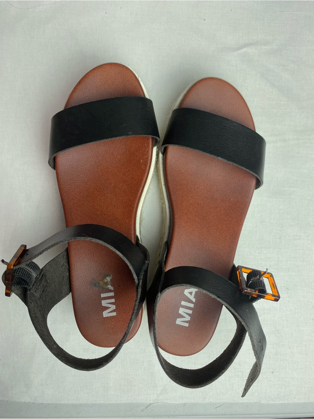 MIA Black Slide Sandals with Brown Footbed and Tortoise Buckle